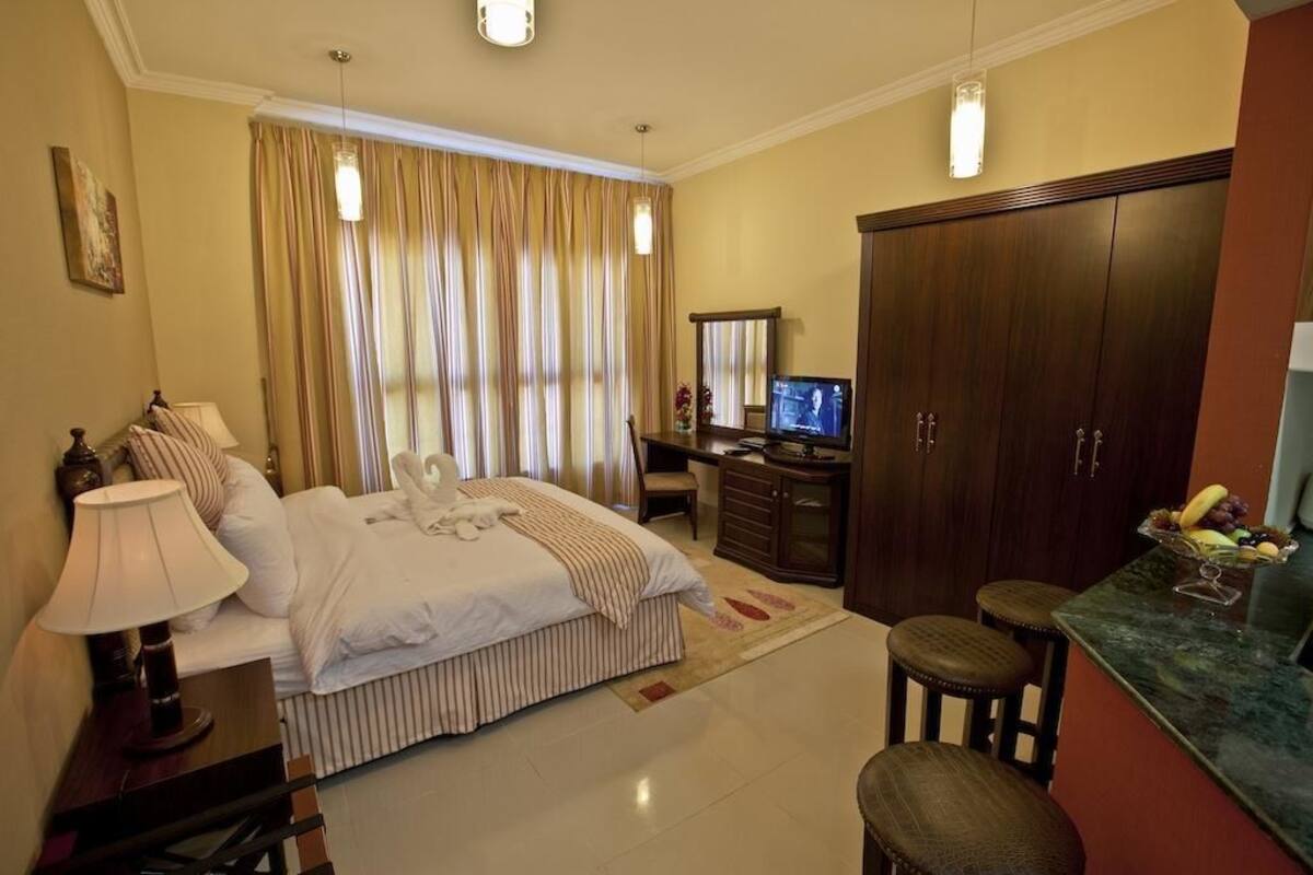 Appartement Deluxe, 2 chambres | Coffres-forts dans les chambres, fer et planche à repasser