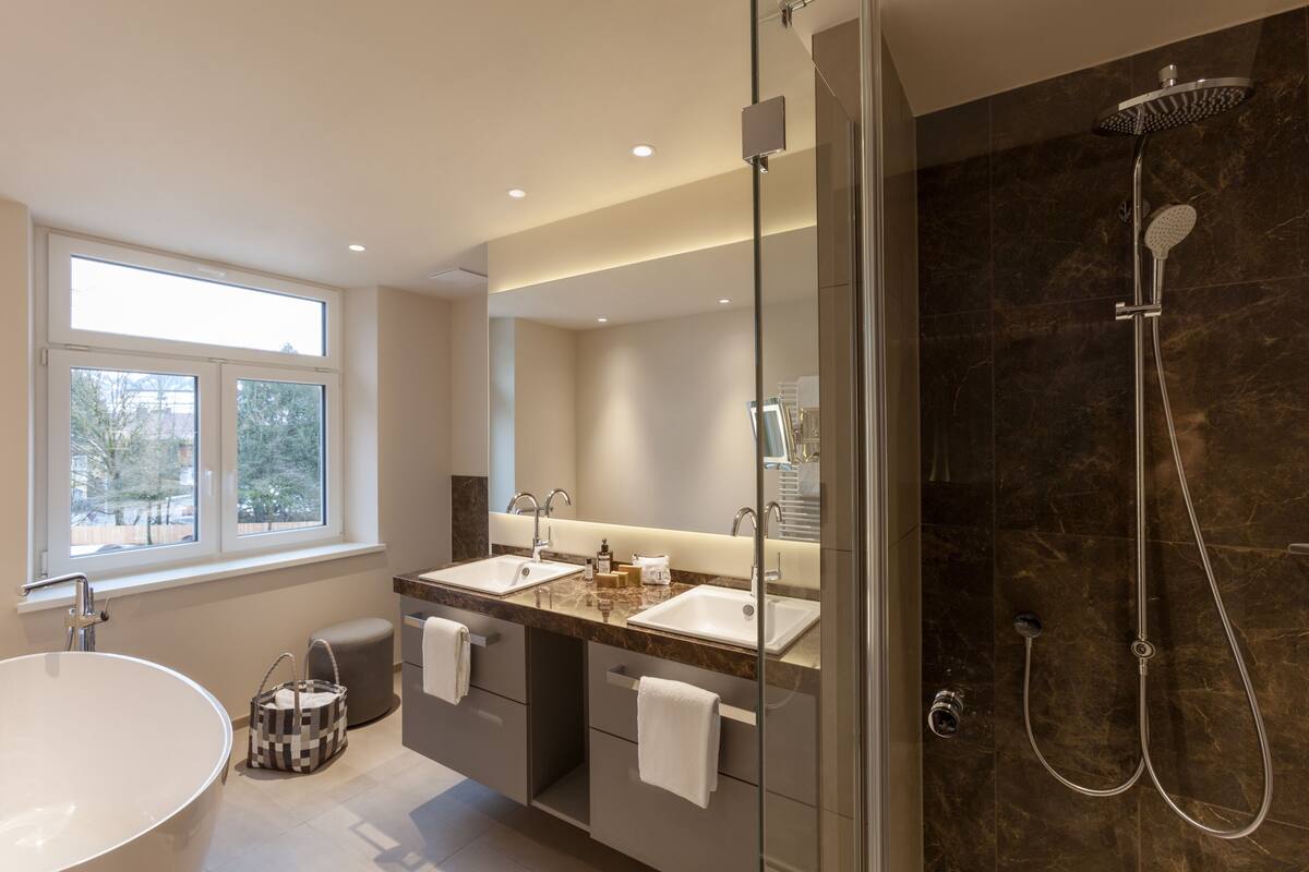 premium double room | bathroom | shower, free toiletries, hair dryer, bathrobes