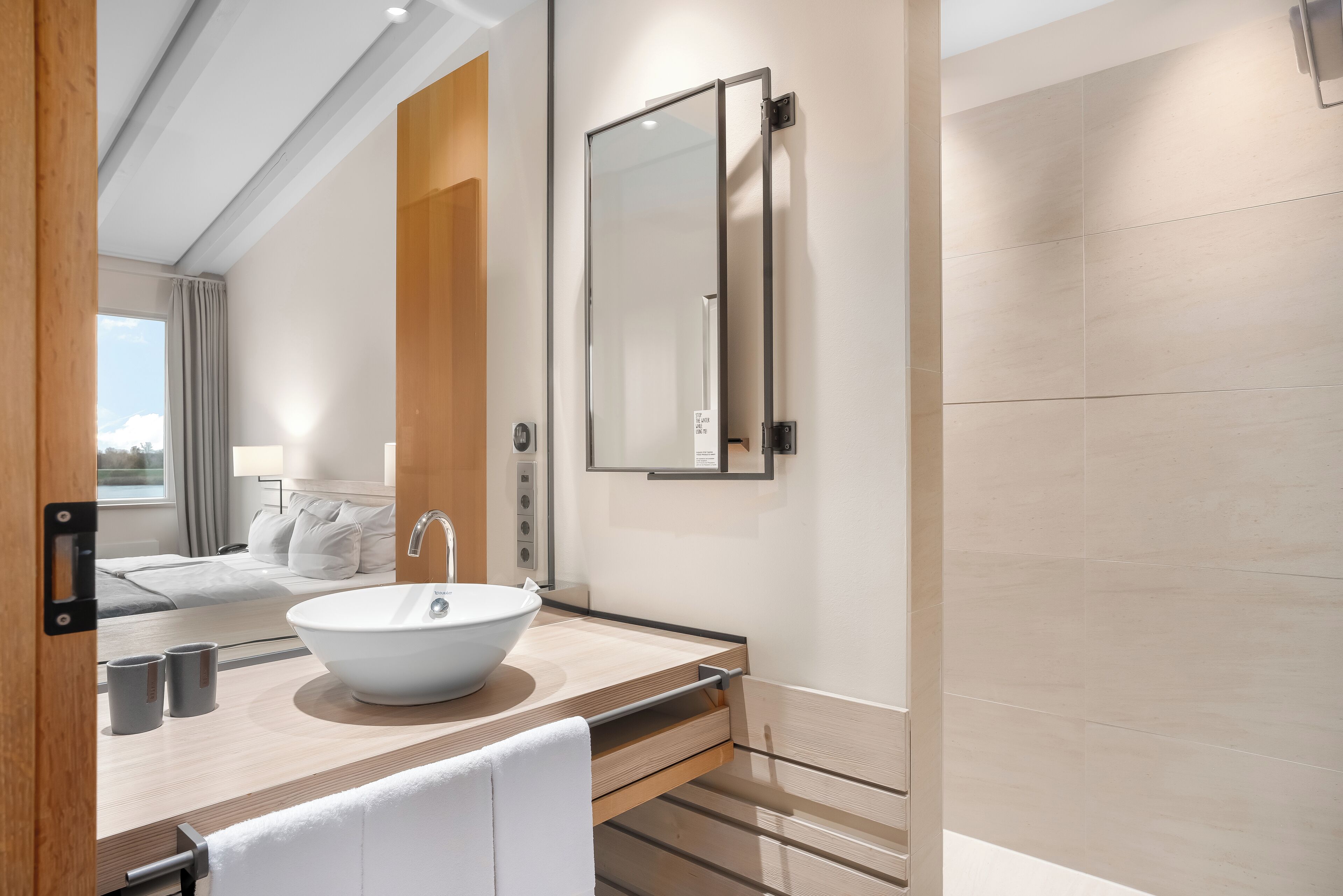 comfort double room, river view | bathroom | free toiletries, hair dryer, bathrobes, slippers