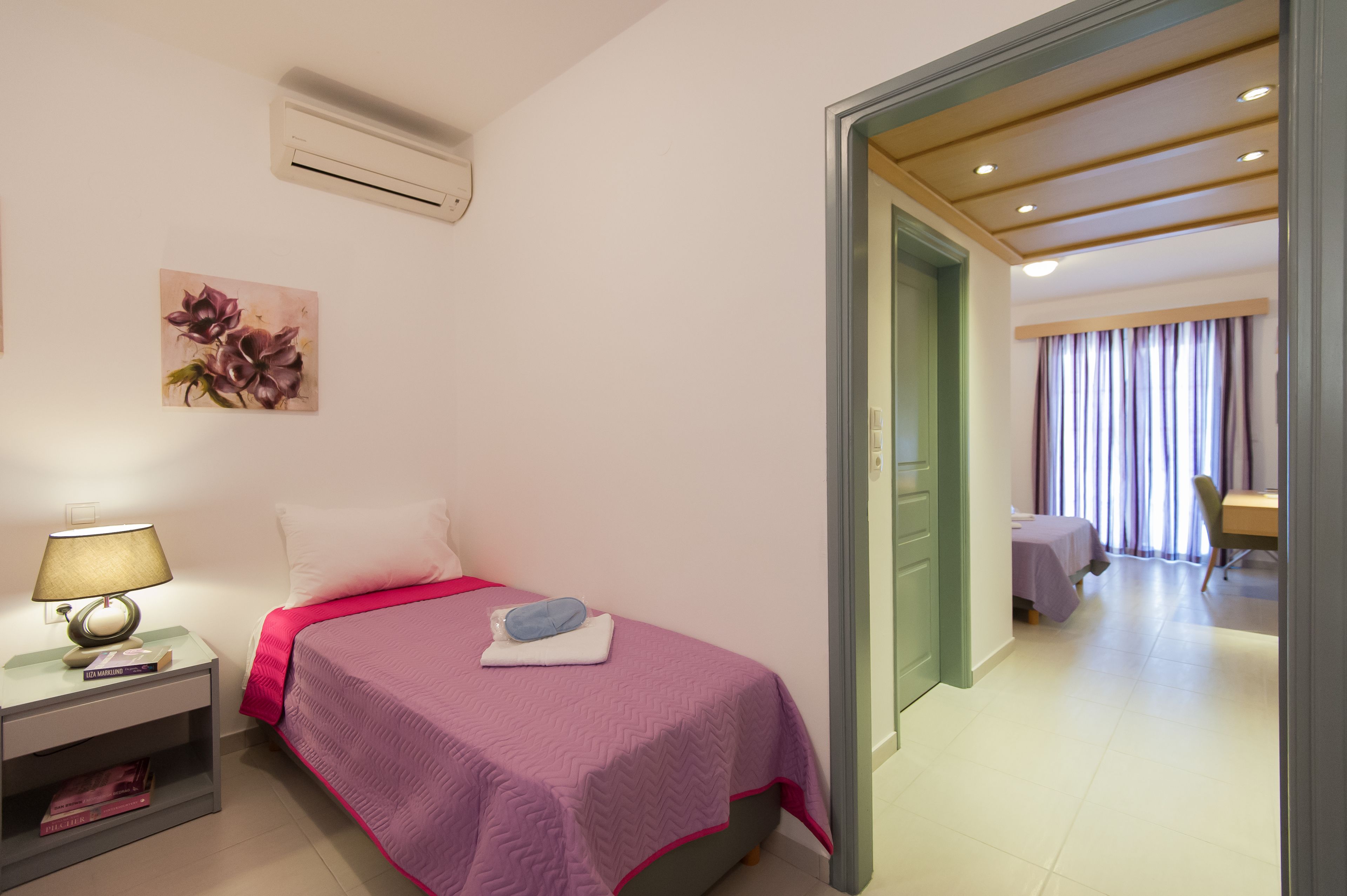 family room | desk, blackout curtains, soundproofing, iron/ironing board