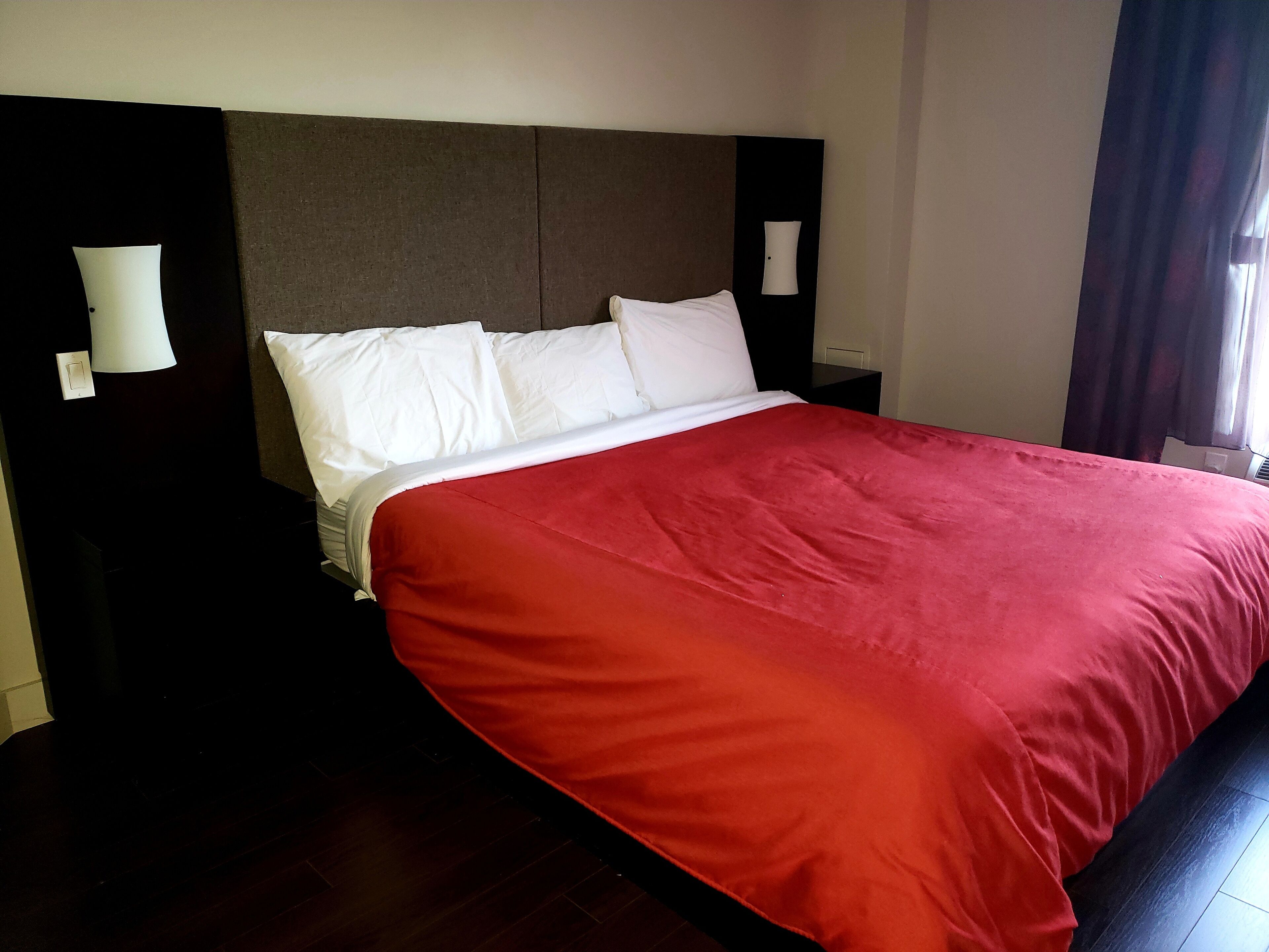 luxury suite, 1 king bed, river view | desk, blackout curtains, iron/ironing board, cots/infant beds