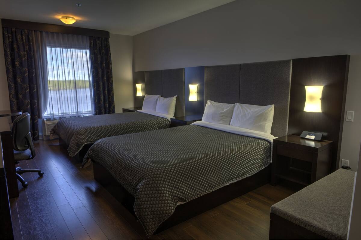 desk, blackout curtains, iron/ironing board, cots/infant beds