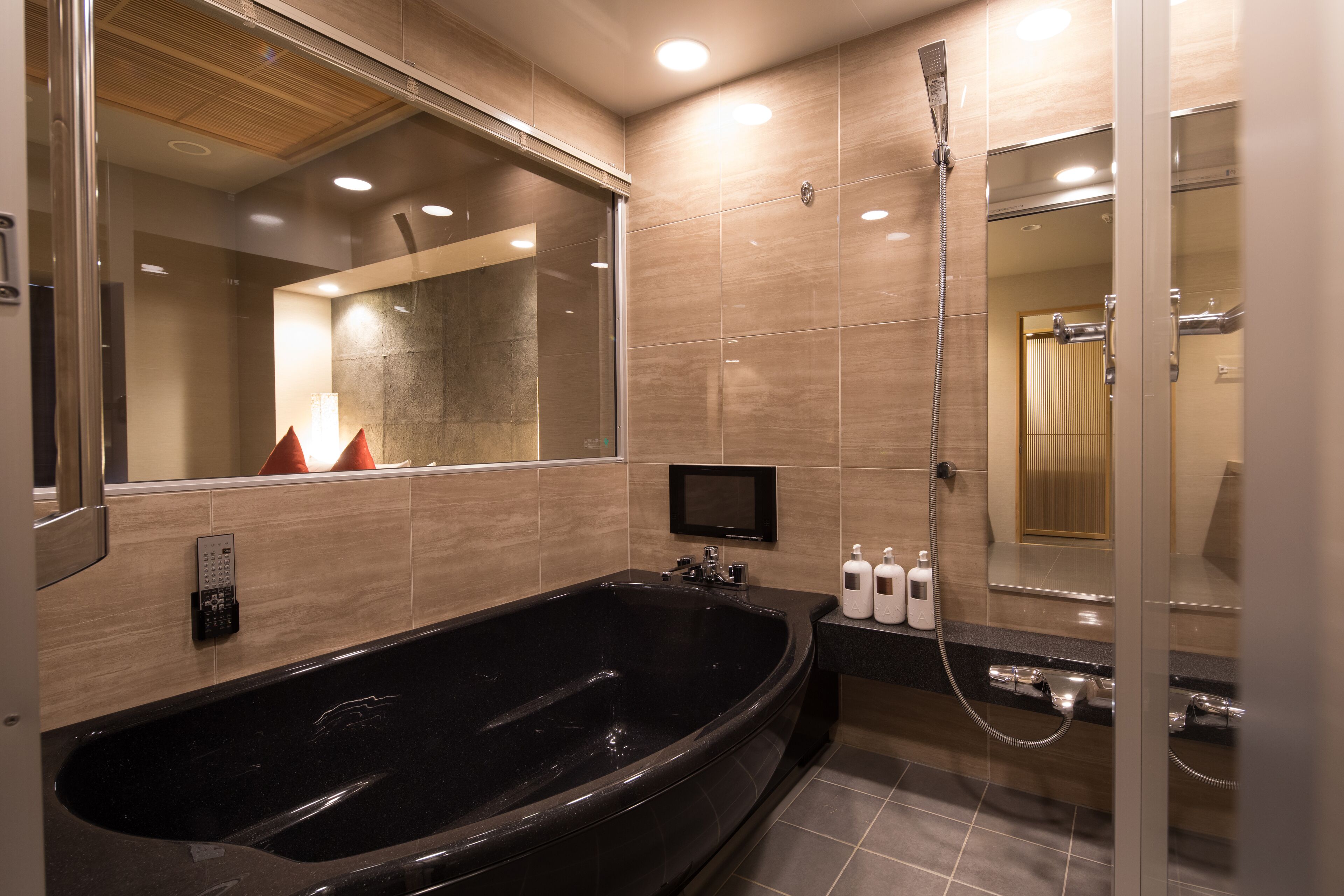 modern japanese style room, ren | bathroom | separate bathtub and shower, free toiletries, hair dryer, slippers