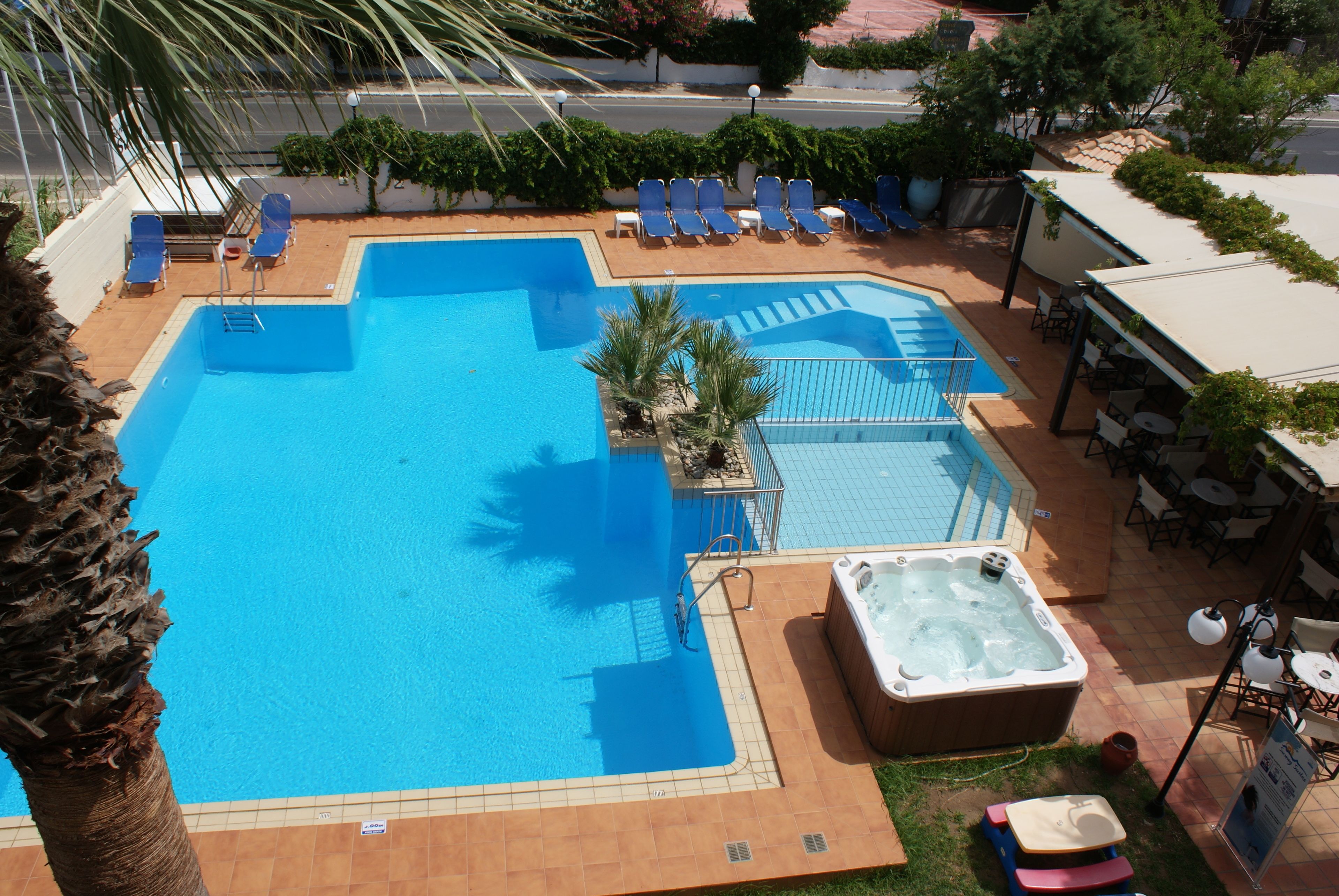 2 outdoor pools, pool umbrellas, pool loungers