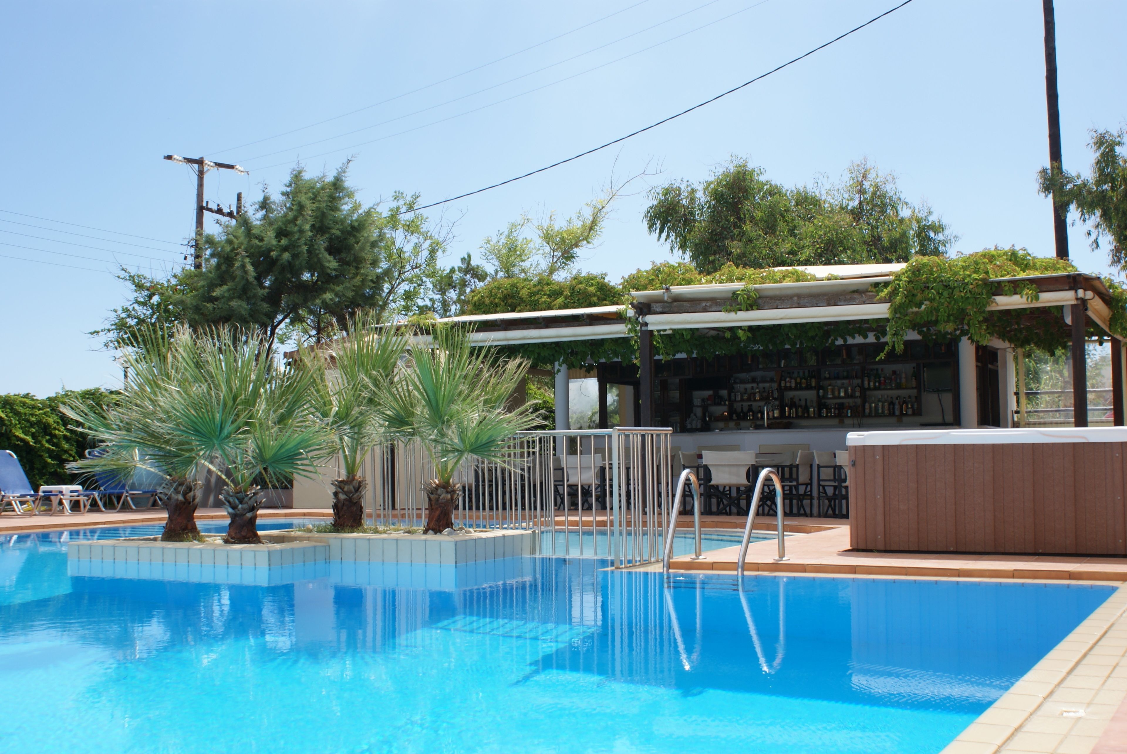 2 outdoor pools, pool umbrellas, pool loungers