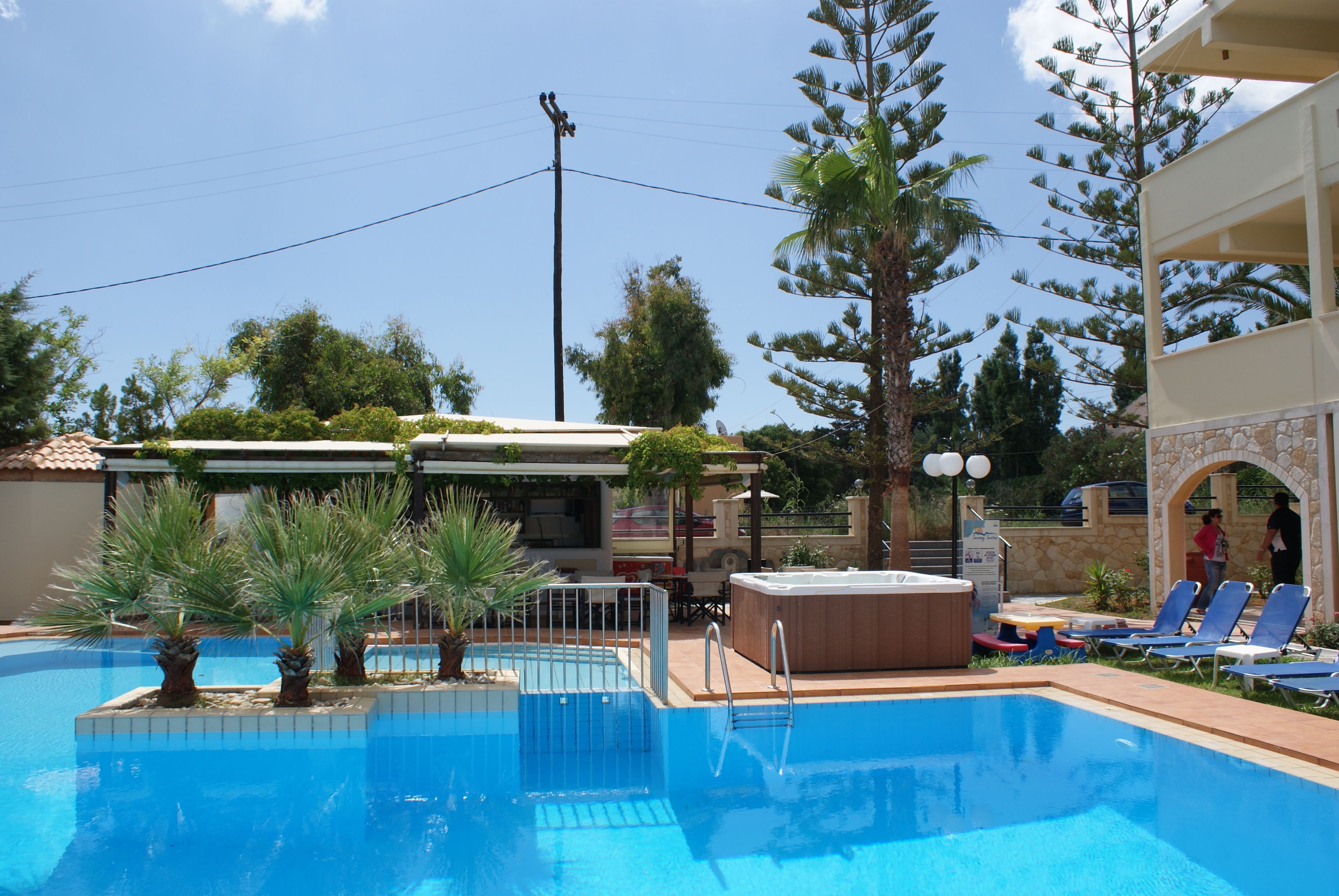 2 outdoor pools, pool umbrellas, pool loungers