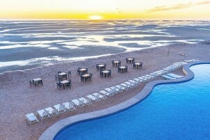 Private beach, white sand, free beach cabanas, sun loungers