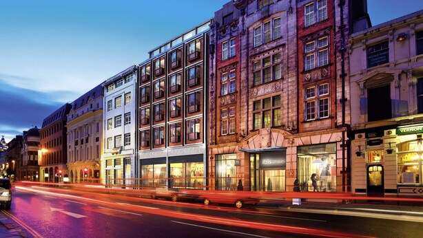 A multi-story building with a mix of architectural styles, including a prominent corner building with a sign for 'Pioneer Buildings'. - ibis Styles Liverpool Centre Dale Street (Liverpool)