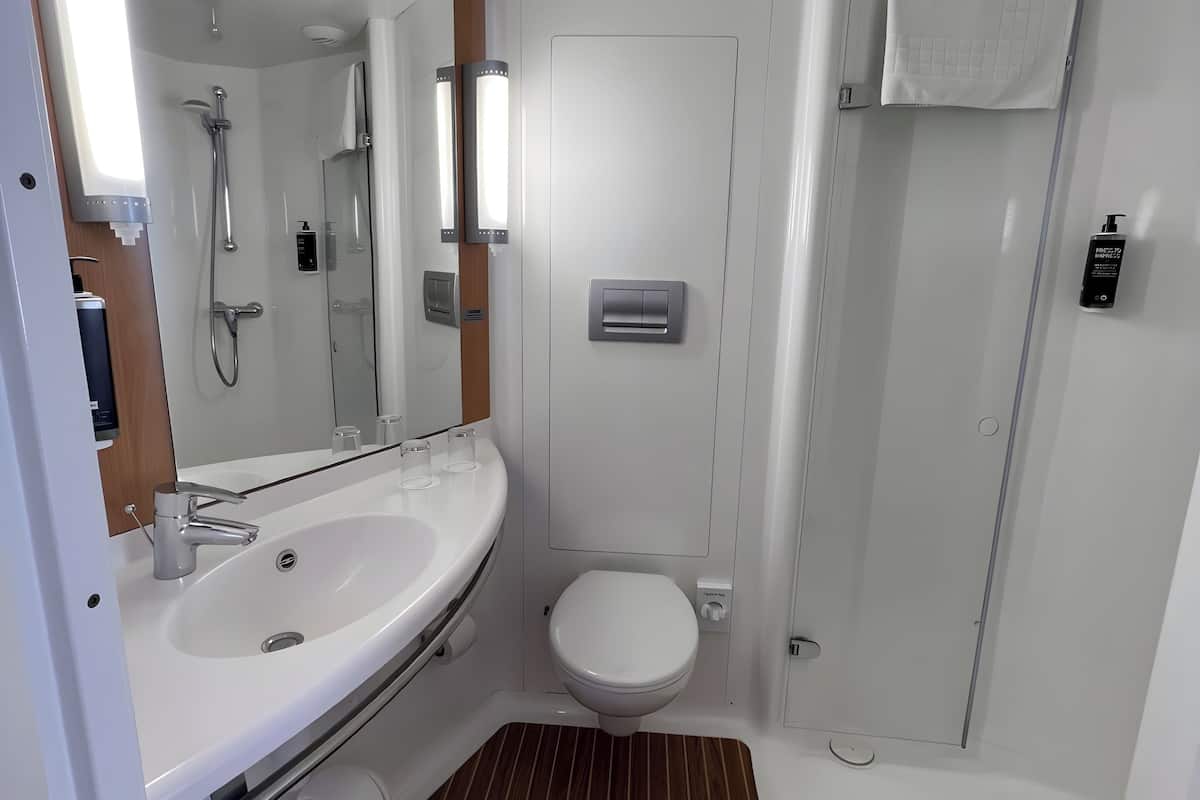 shower, eco-friendly toiletries, hair dryer, towels