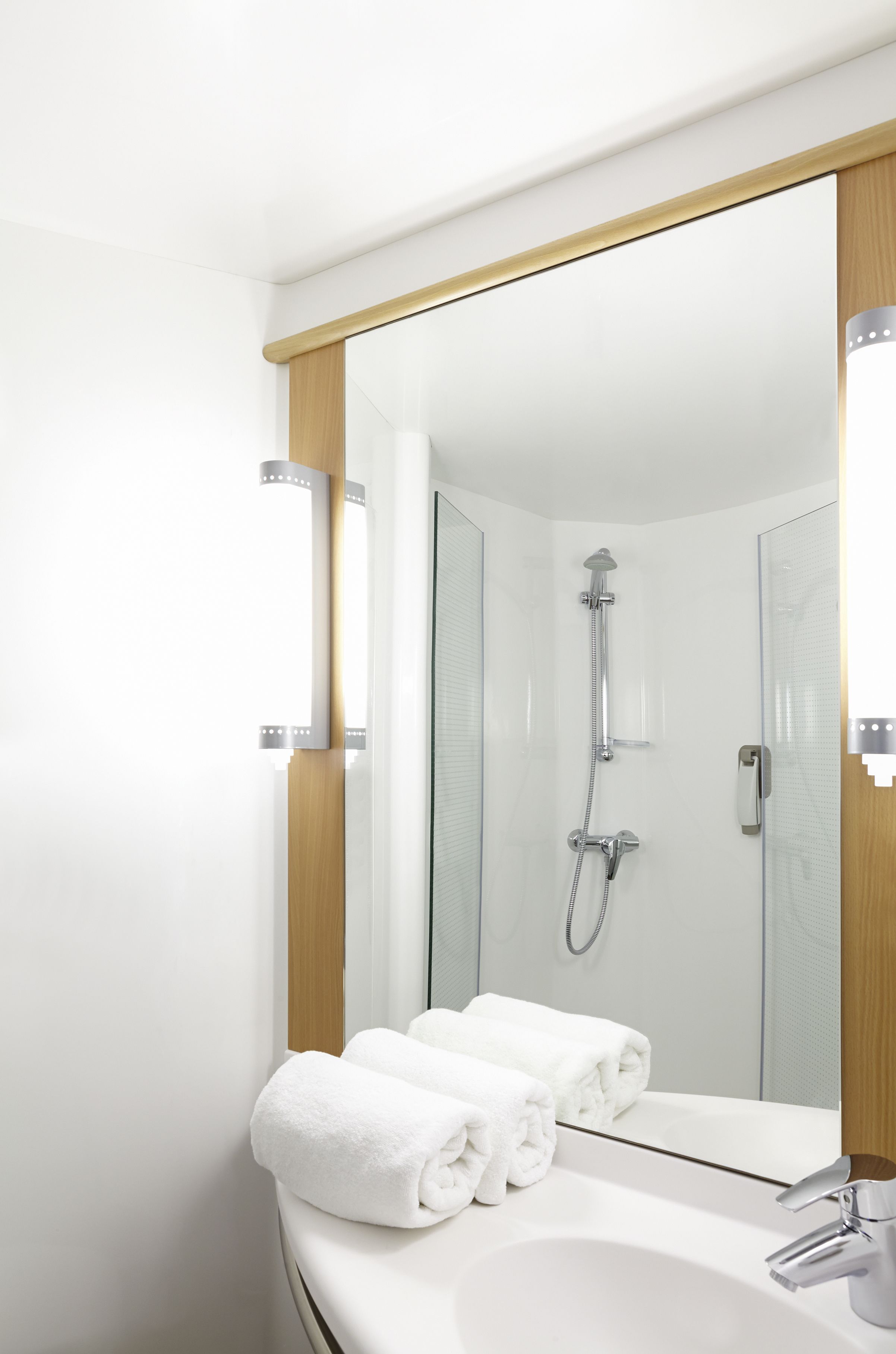 shower, eco-friendly toiletries, hair dryer, towels