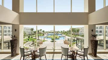 2 bars/lounges, poolside bar, beach bar