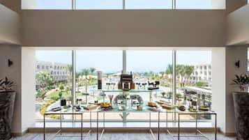 2 bars/lounges, poolside bar, beach bar