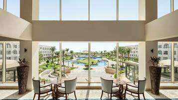 2 bars/lounges, poolside bar, beach bar
