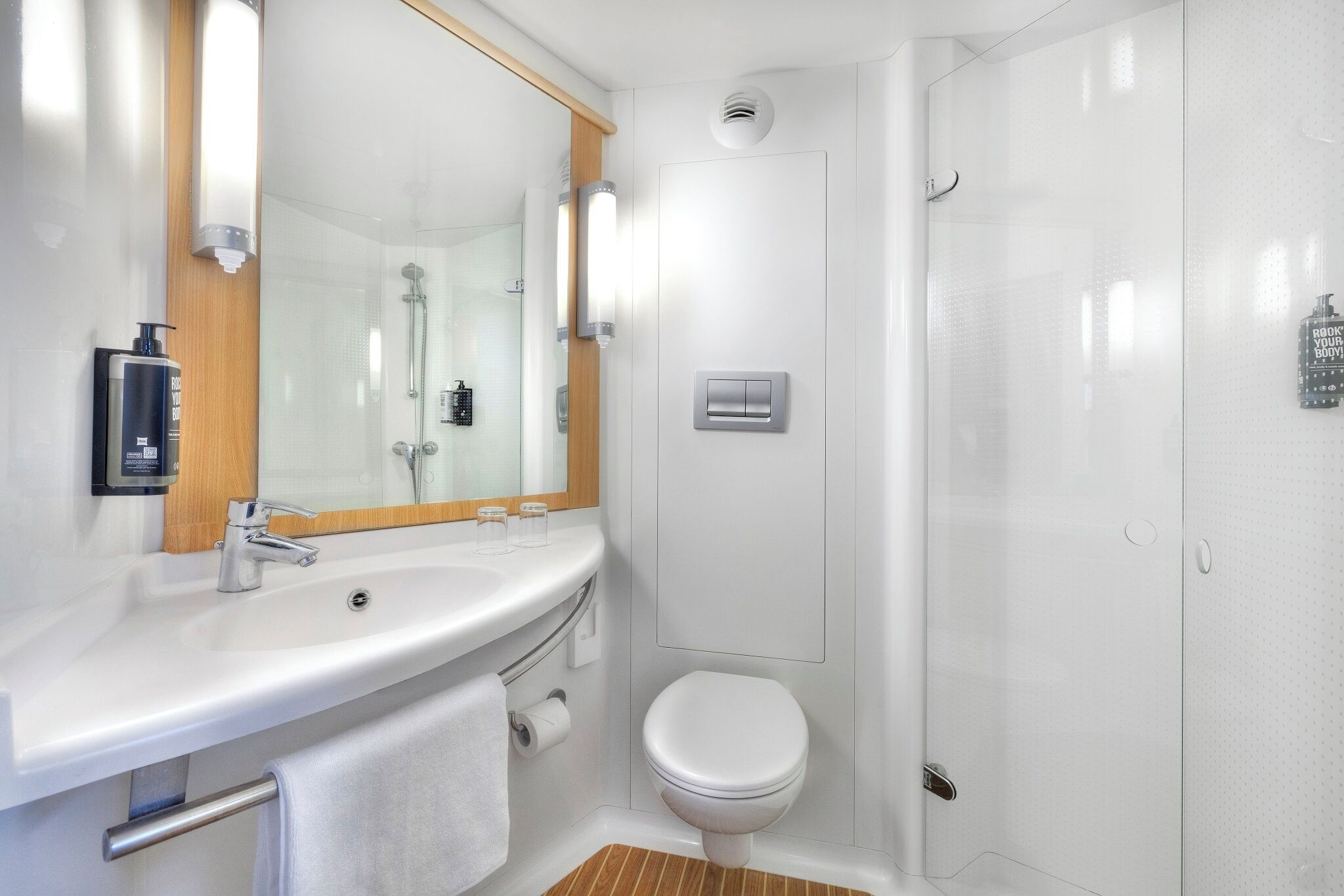 shower, eco-friendly toiletries, hair dryer, towels