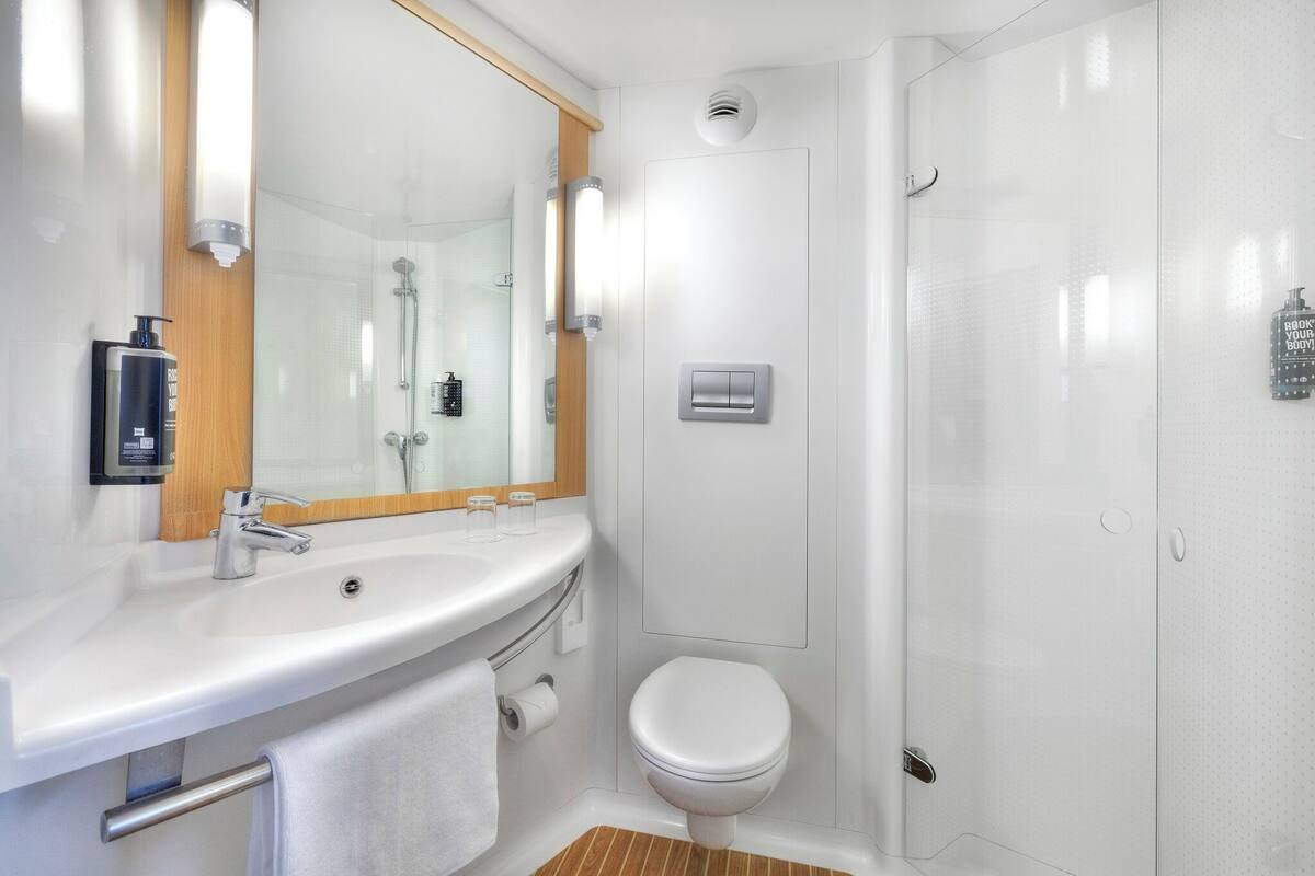 shower, eco-friendly toiletries, hair dryer, towels