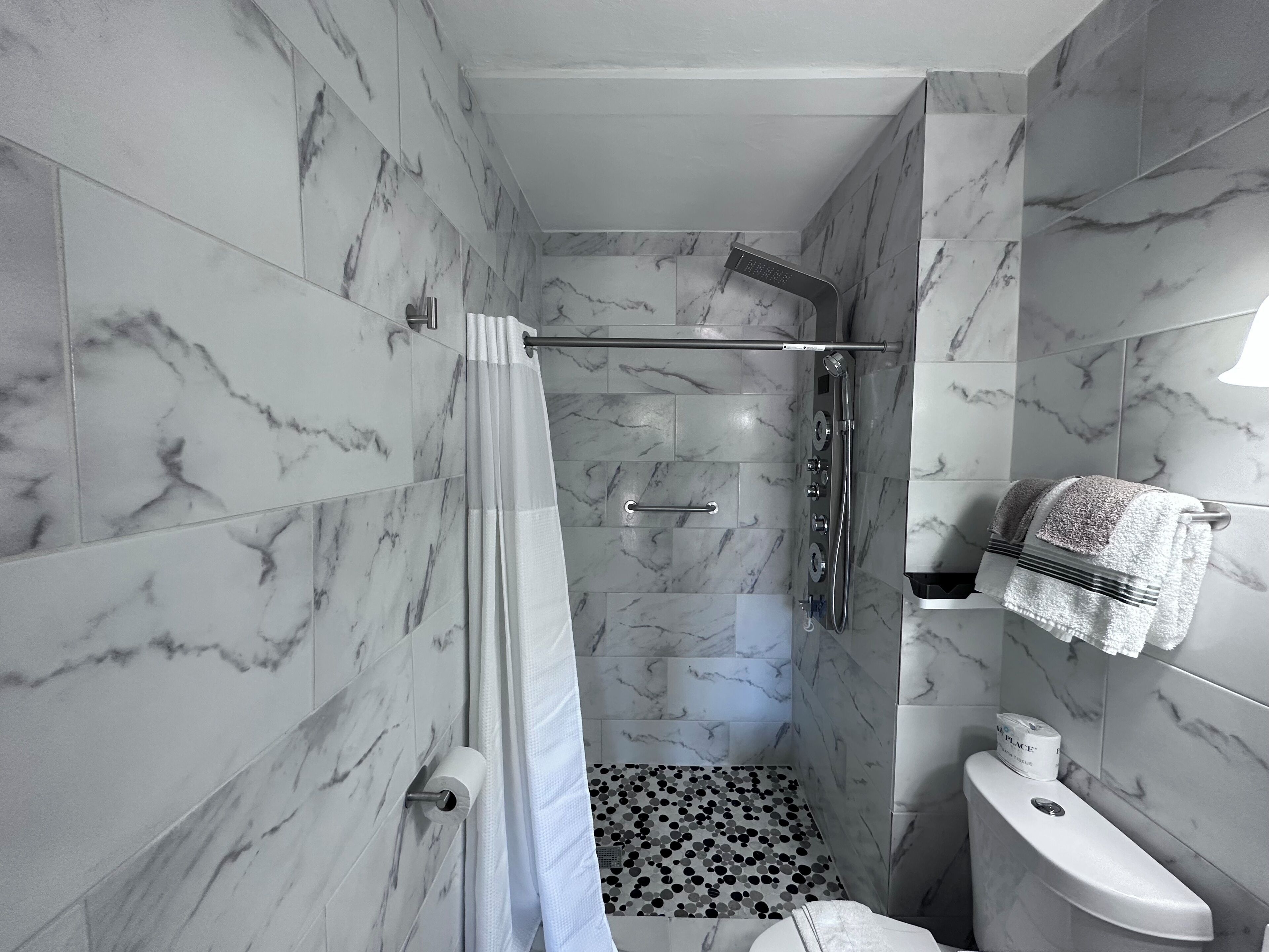 Deluxe Room, 2 Queen Beds, Non Smoking, Refrigerator & Microwave | Bathroom | Rainfall showerhead, free toiletries, towels, soap