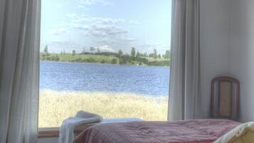 Bungalow, 2 Bedrooms | 2 bedrooms, down duvets, pillow-top beds, individually decorated