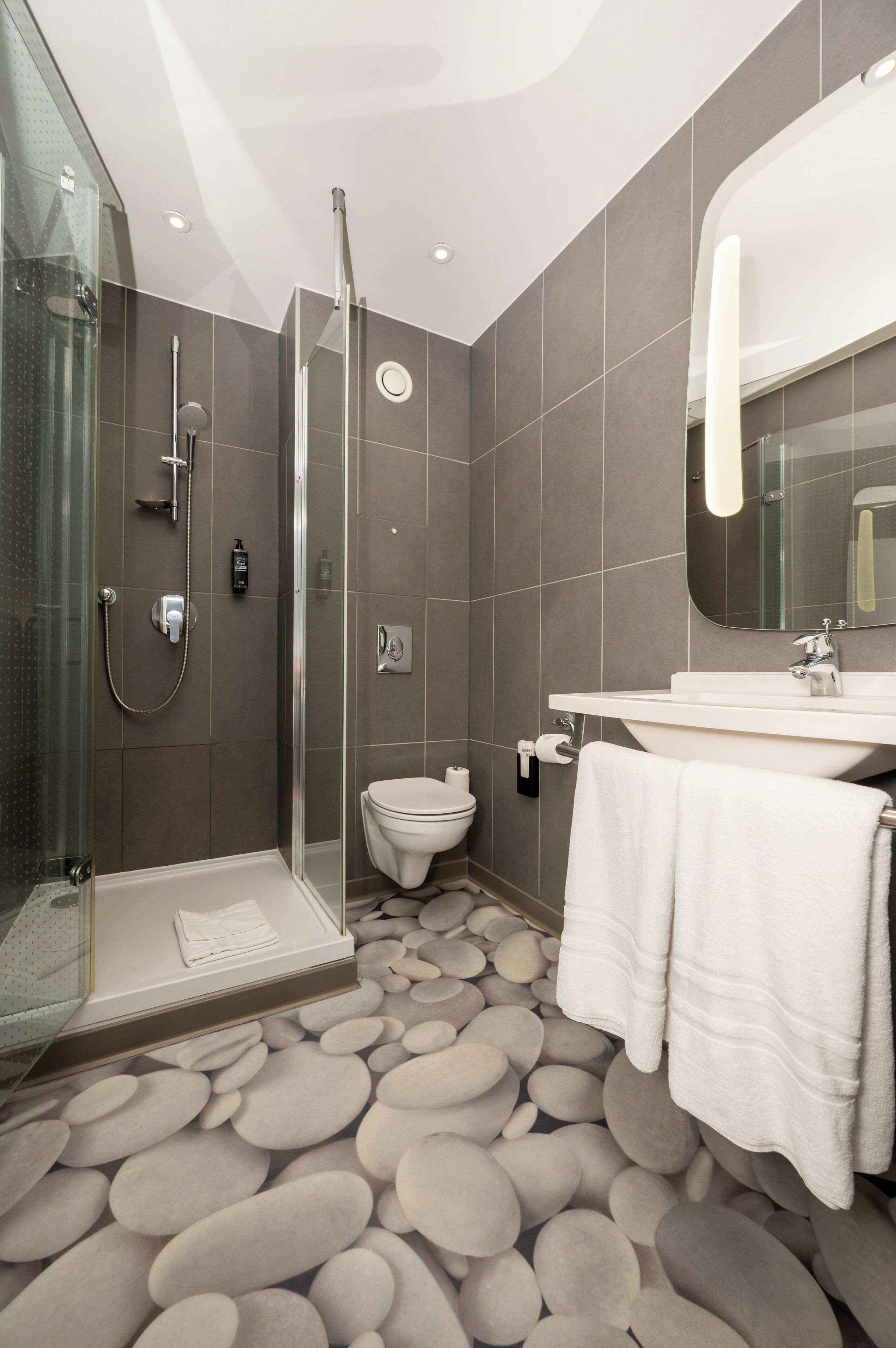 Shower, eco-friendly toiletries, hair dryer, towels