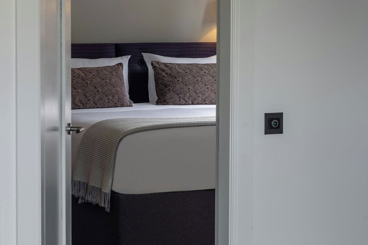 Suite, 1 Bedroom, City View | Egyptian cotton sheets, in-room safe, soundproofing, iron/ironing board