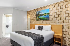 King Room, 1 King Bed | Down comforters, pillowtop beds, in-room safe, individually decorated