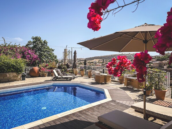 Outdoor pool, pool umbrellas, pool loungers