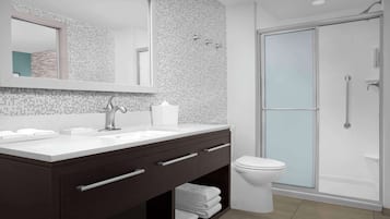 One Bedroom Suite, One King Bed, Non-Smoking | Bathroom | Combined shower/tub, free toiletries, hair dryer, towels