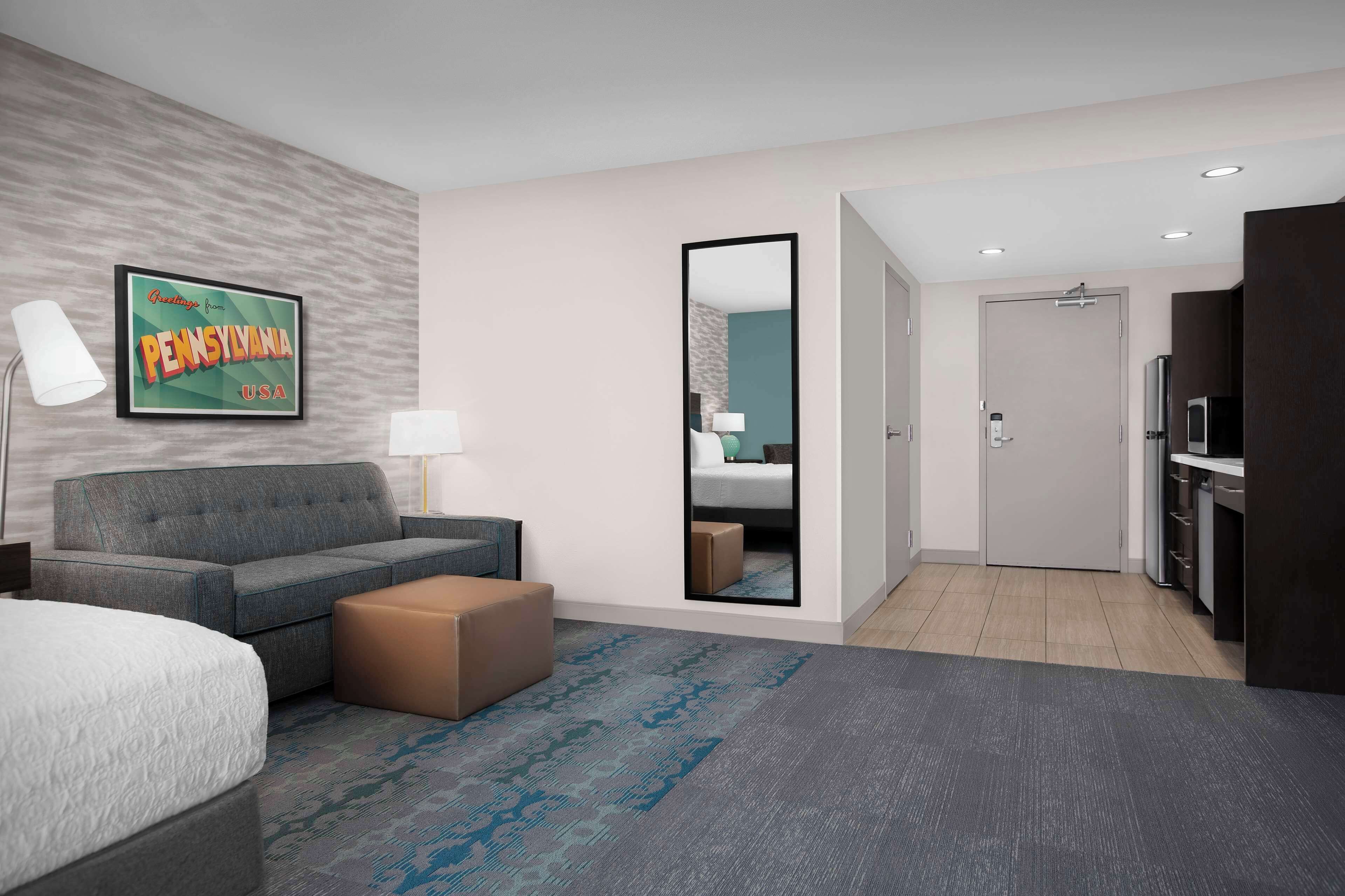 Suite | Zona de estar | Televisión LCD de 42 pulgadas con canales por cable, una televisión