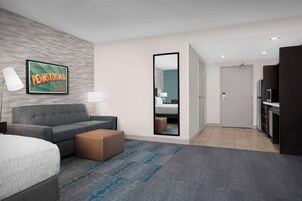 One King Accessible Tub Studio Suite Non-smoking | Living area | 42-inch LCD TV with cable channels, TV, iPod dock