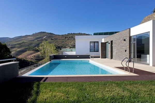 Seasonal outdoor pool, pool umbrellas, pool loungers