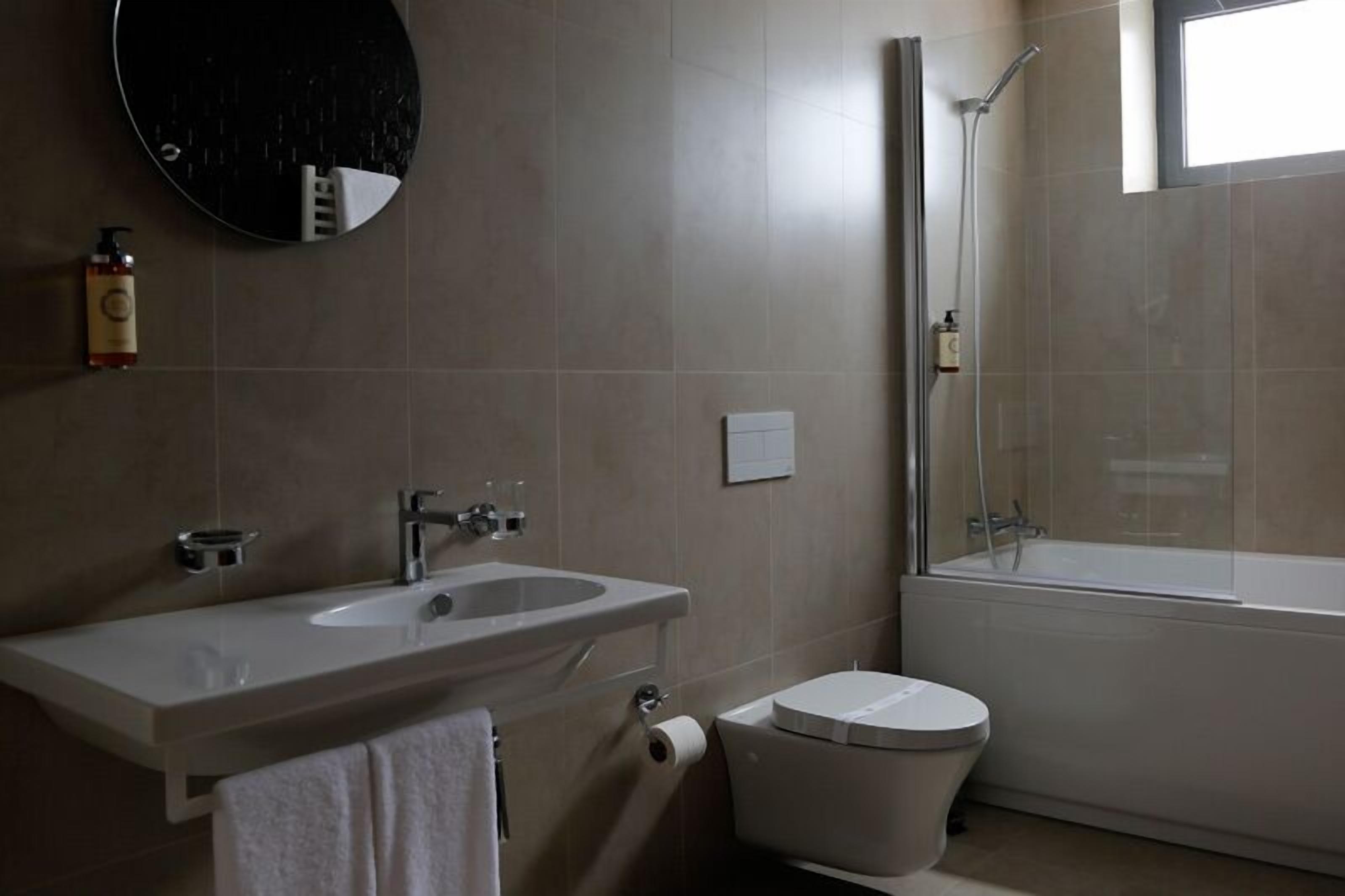 hair dryer, bathrobes, towels