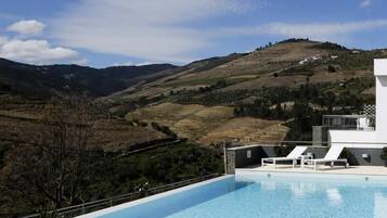 Seasonal outdoor pool, pool umbrellas, sun loungers