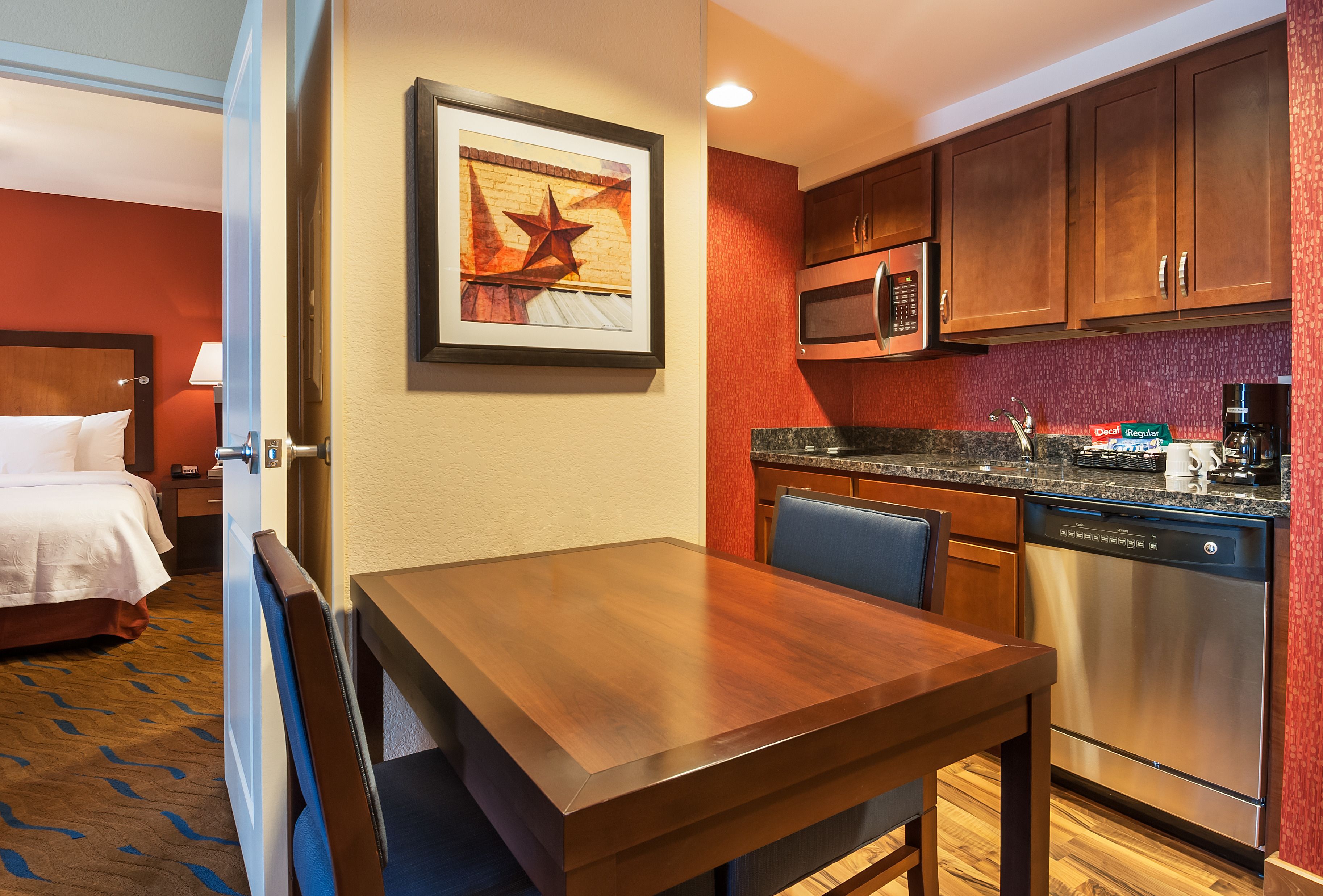 Full-size fridge, microwave, stovetop, dishwasher