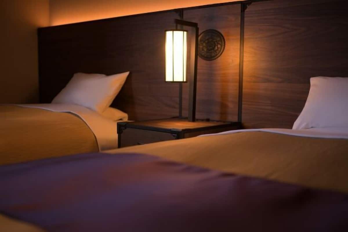 Luxe beddengoed, een minibar, een kluis op de kamer