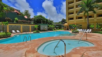 Outdoor pool, open 9:00 AM to 5:00 PM, pool loungers