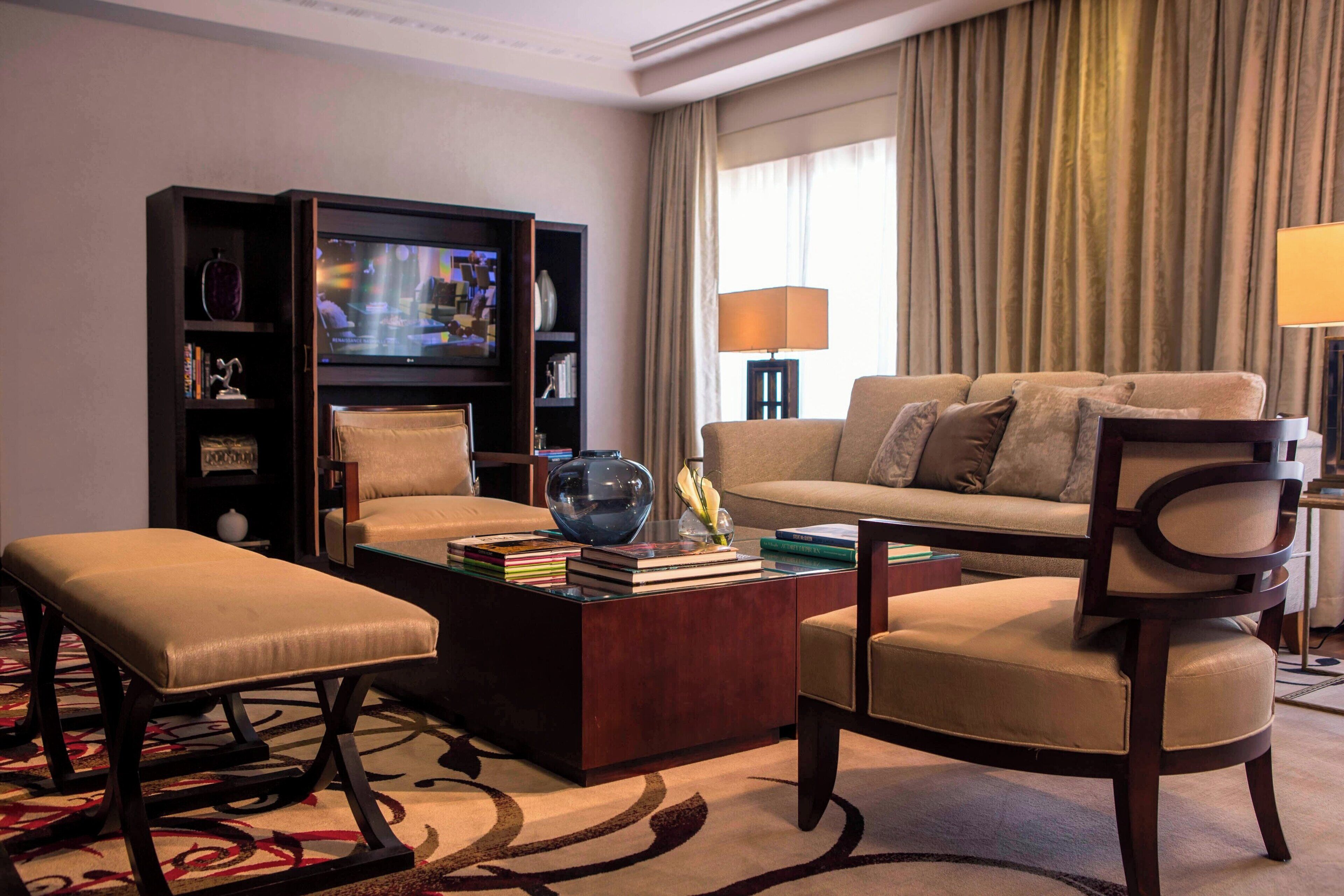 presidential suite, 1 king bed, non smoking, pool view | living room | 32-inch lcd tv with cable channels, tv, pay films