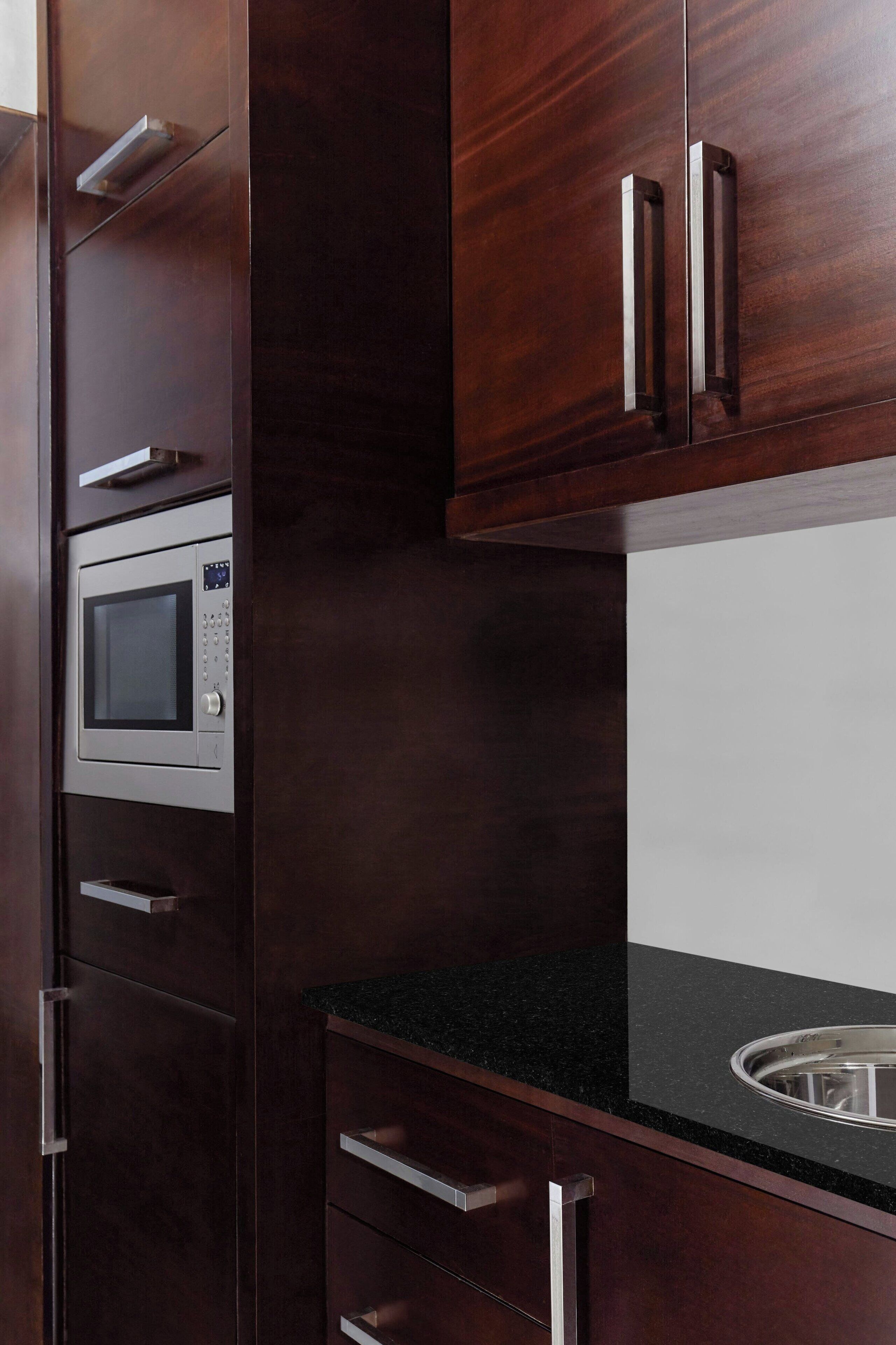 presidential suite, 1 king bed, non smoking, pool view | private kitchen | coffee/tea maker, electric kettle