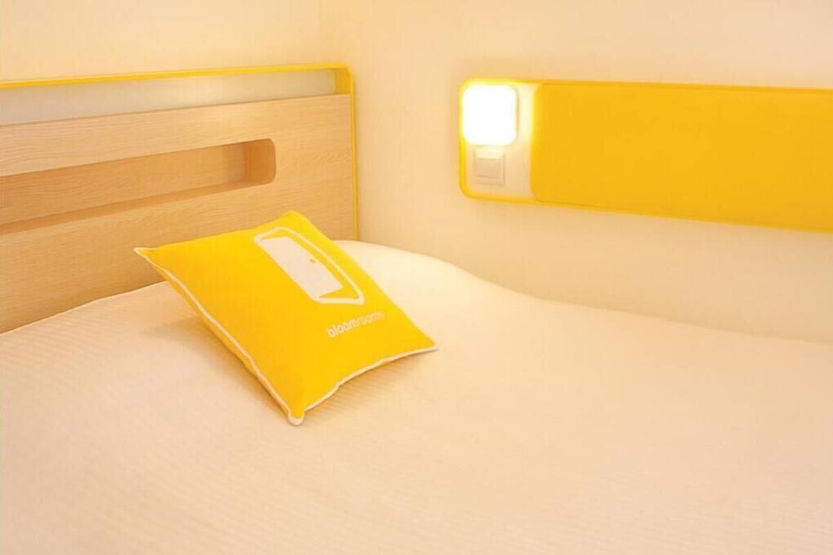 Luxe beddengoed, een kluis op de kamer, een bureau, geluiddichte muren