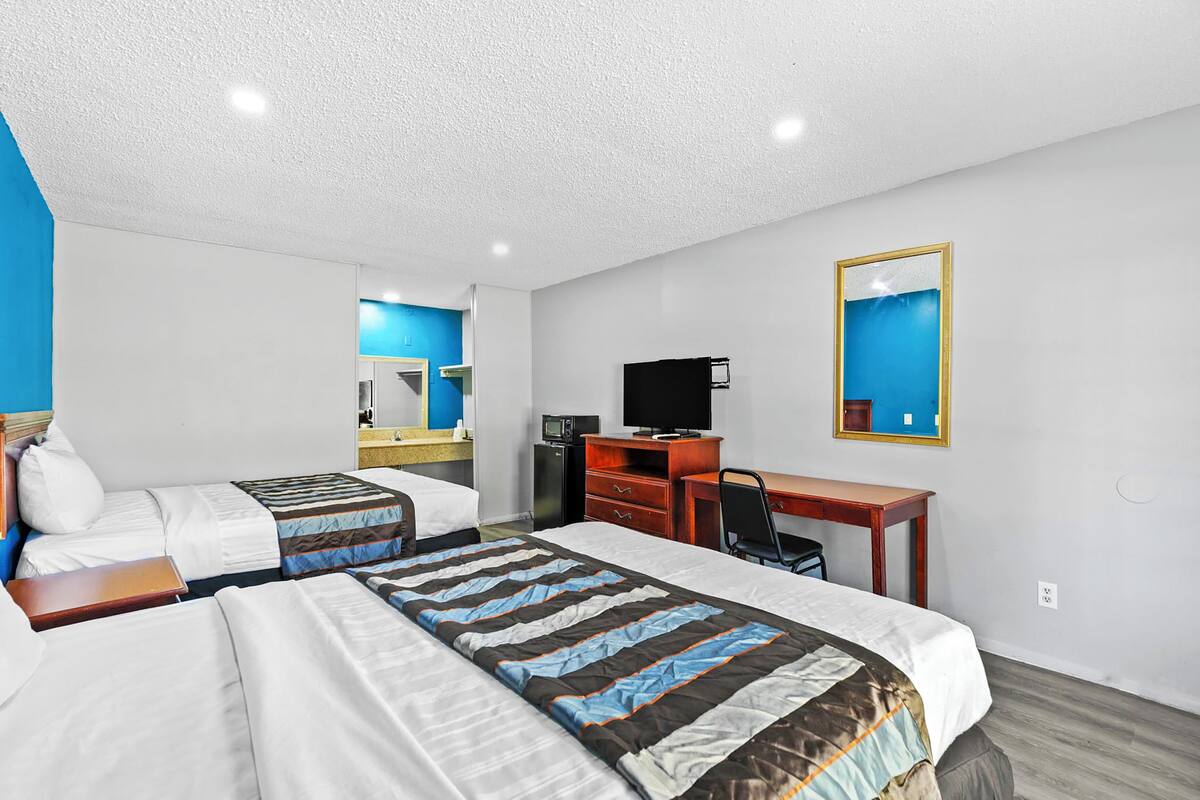 Room, 2 Queen Beds, Non Smoking | Desk, iron/ironing board, free WiFi, bed sheets