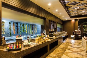 Breakfast, lunch, dinner served; Fusion cuisine, pool views 