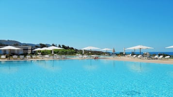 Seasonal outdoor pool, pool umbrellas, sun loungers