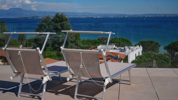 Suite Deluxe | Minibar, una cassaforte in camera, una scrivania, postazione laptop