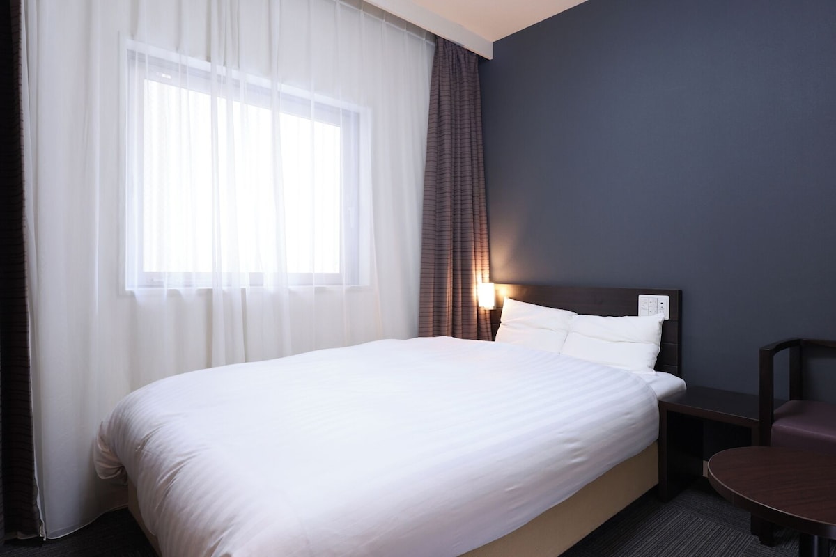 Down comforters, desk, iron/ironing board (on request), WiFi (free)
