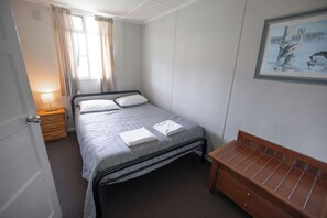 Family Cabin, 3 Bedrooms | Iron/ironing board, bed sheets
