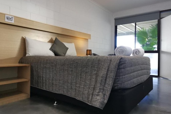 Minibar, desk, blackout drapes, iron/ironing board