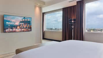 Suite, 1 Bedroom | Minibar, in-room safe, soundproofing, cots/infant beds