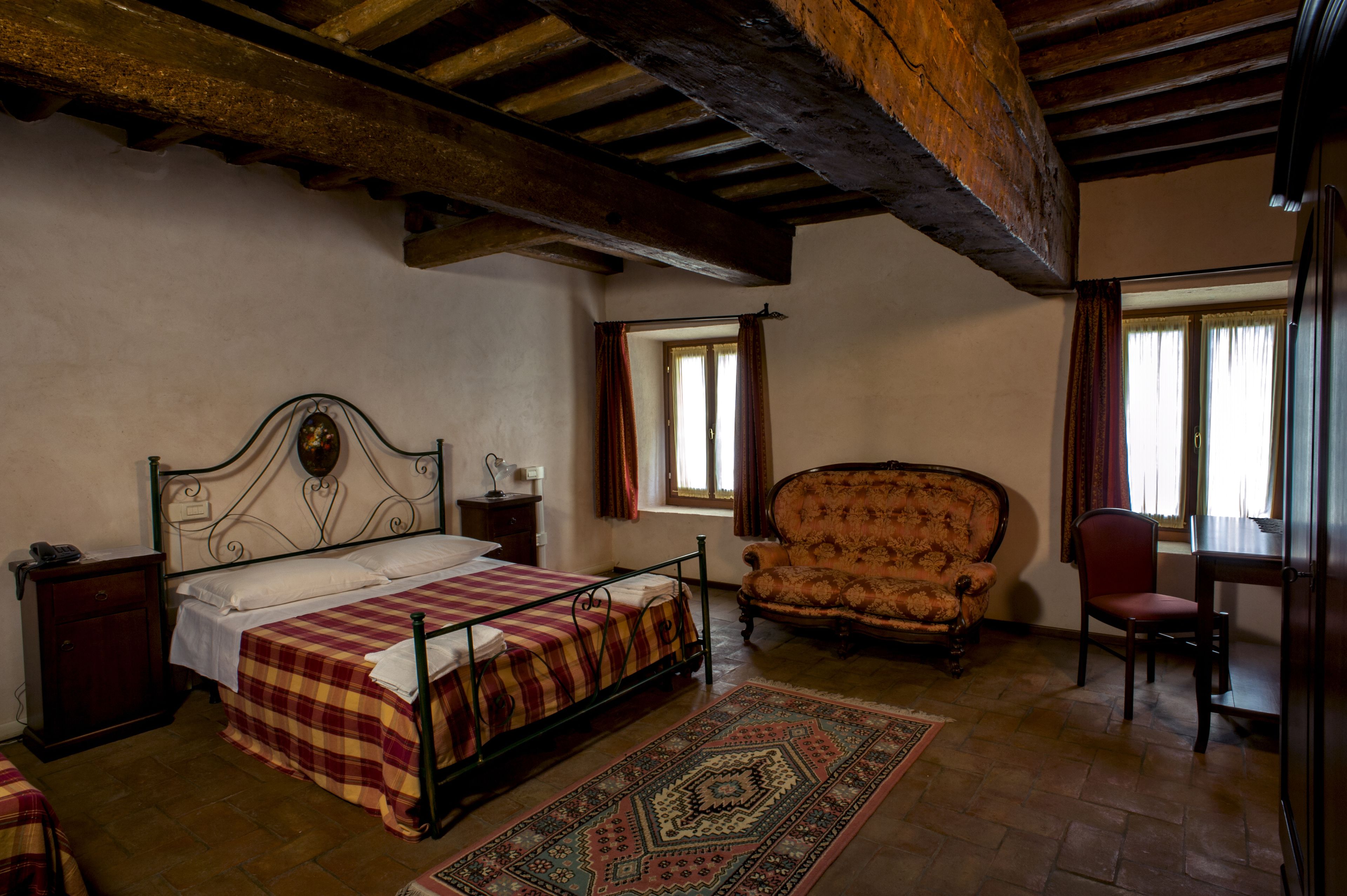 desk, blackout curtains, iron/ironing board, free cots/infant beds