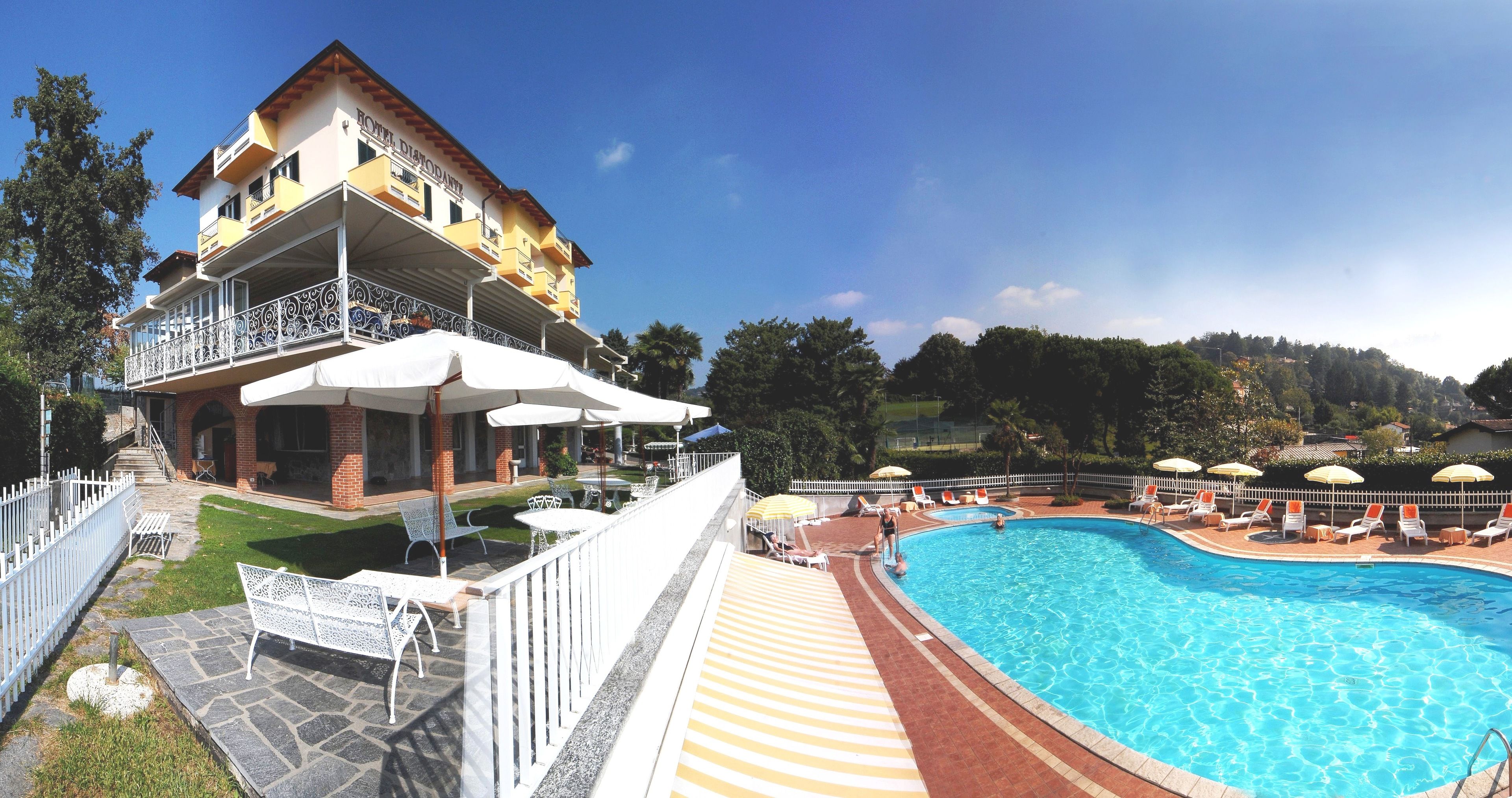 seasonal outdoor pool, pool umbrellas, pool loungers