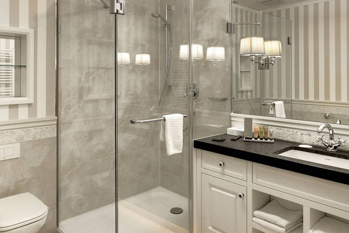 hair dryer, bathrobes, slippers, towels