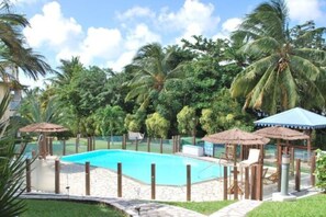 Outdoor pool, pool umbrellas, pool loungers