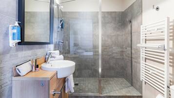 Twin Studio | Bathroom | Hair dryer, towels